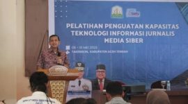 Kepala Dinas Komunikasi, Informasi dan Persandian Aceh Marwan Nusuf saat memberi sambutan pada pembukaan pelatihan penguatan teknologi informasi media siber di hotel renggali takengon Selasa (9/5/2023).