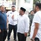 Sekda Aceh Besar  Sulaimi didampingi oleh Camat Blang Bintang dan Keuchik Bueng Sidom sambut Dirjen Pemdes yang didampingi Kaban PMG Aceh. (Foto MC Aceh Besar)