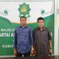 Hasbi Affan (Cekbi) bersama Calon Bupati Aceh Timur Tgk Ridwan Abubakar (Nektu) 
Foto : Ist
