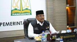 Pj Gubernur Aceh, Dr.H. Safrizal ZA, M.Si., melakukan rapat persiapan PON XXI Aceh-Sumut bersama Bupati/Walikota se-Aceh secara Virtual di ruang Kerja Gubernur Aceh, selasa (27/8/2024)