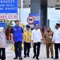 Penjabat (Pj) Bupati Aceh Besar Muhammad Iswanto SSTP MM, menyambut kedatangan Presiden Jokowi bersama Ibu Iriana Jokowi serta para rombongan di titik peresmian JalanTol Sigli-Banda Aceh (Sibanceh) di Pintu Tol Baitussalam, Aceh Besar, Senin (9/9/2024)