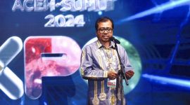Plh Sekda Aceh Azwardi saat membuka dan menyampaikan sambutan pada PON Expo XXI Aceh-Sumut tahun 2024 di lapangan blang padang Banda Aceh, Selasa  (10/9/2024).