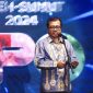 Plh Sekda Aceh Azwardi saat membuka dan menyampaikan sambutan pada PON Expo XXI Aceh-Sumut tahun 2024 di lapangan blang padang Banda Aceh, Selasa  (10/9/2024).