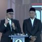 Pasangan Calon Gubernur dan Wakil Gubernur Aceh Nomor 01 Bustami-Syech Fadhil pada acara debat perdana Pilgub Aceh 2024 (Foto: Tangkapan layar YouTube Kompas TV)