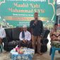 Geuchik Gampong Baet Baitussalam Aceh Besar Agus Mawar memberikan sambutan pada acara peringatan Maulid Nabi Muhammad Saw 1446 H di Komplek Flamboyan Dusun Krueng Cut Sabtu (7/12/2024).