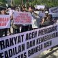 Ratusan warga yang tergabung dalam aliansi “Rakyat Aceh Menggugat