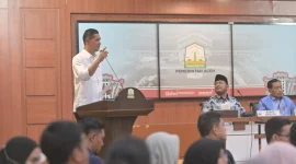 Sekretaris Daerah Aceh, M. Nasir melaunching Dashboard Peta aksi dan Partisipasi masyarakat untuk penanggulangan bencana Aceh di Gedung Serbaguna Setda Aceh Jumat (27/2/2026) Foto : Humas Pemerintah Aceh