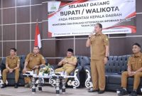 Kepala Dinas Komunikasi dan Informatika (Diskominfo) Kabupaten Aceh Besar, Imam Munandar, S.TP, memaparkan Keterbukaan Informasi Badan Publik Tahun 2026 yang diselenggarakan Komisi Informasi Aceh (KIA) di Banda Aceh, Senin 12 Oktober 2026.
