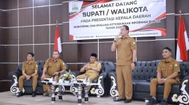 Kepala Dinas Komunikasi dan Informatika (Diskominfo) Kabupaten Aceh Besar, Imam Munandar, S.TP, memaparkan Keterbukaan Informasi Badan  Publik Tahun 2026 yang diselenggarakan Komisi Informasi Aceh (KIA) di Banda Aceh, Senin 12 Oktober 2026.