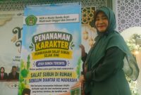 Kepala Madrasah Ibtidaiyah Negeri (MIN) 6 Banda Aceh Dr. Dahrina M, S.Ag, MA