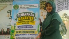 Kepala Madrasah Ibtidaiyah Negeri (MIN) 6 Banda Aceh Dr. Dahrina M, S.Ag, MA