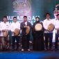 Bupati Aceh Besar H Muharram Idris (Syech Muharram), memimpin prosesi penabuhan beduk secara simbolis pembukaan MTQ XXXV tingkat Kabupaten Aceh Besar tahun 2026, Sabtu (24/10/2026) malam di Lapangan Bung Cala, Kecamatan Kuta Baro, Kabupaten Aceh Besar